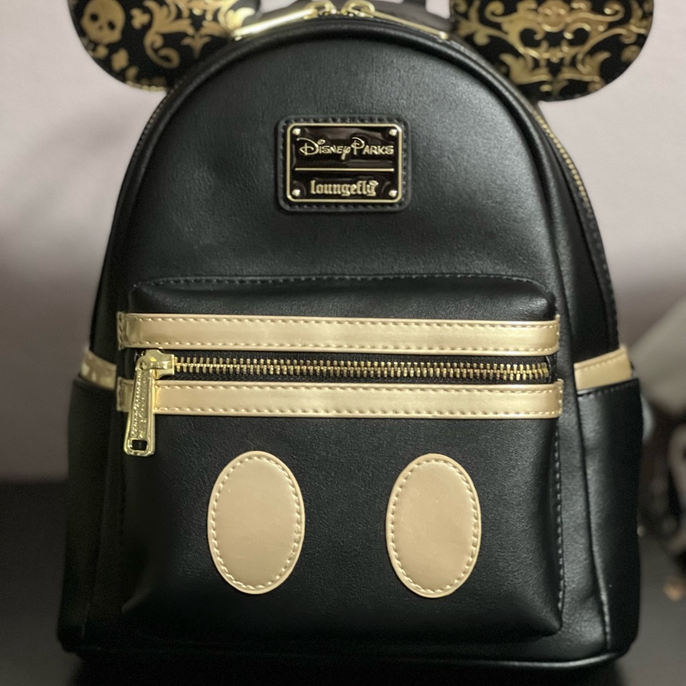 Disney Parks Pirates of the Caribbean Loungefly mini backpack with matching Ears